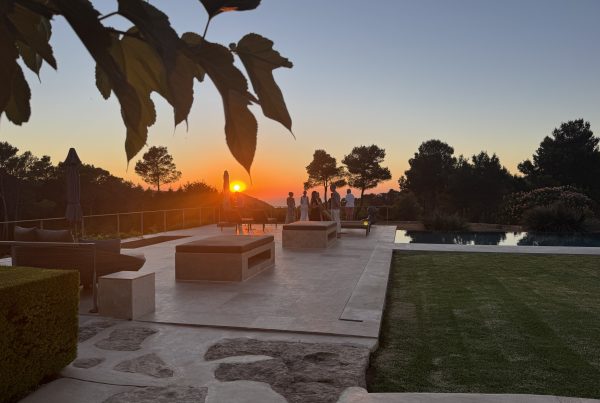 Sunset over the terrace and pool at one of stana's European residences